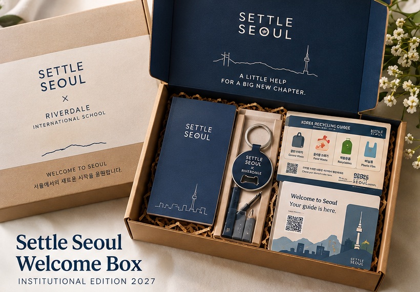 Open Settle Seoul welcome box with notepad, bottle opener, recycling guide and welcome card